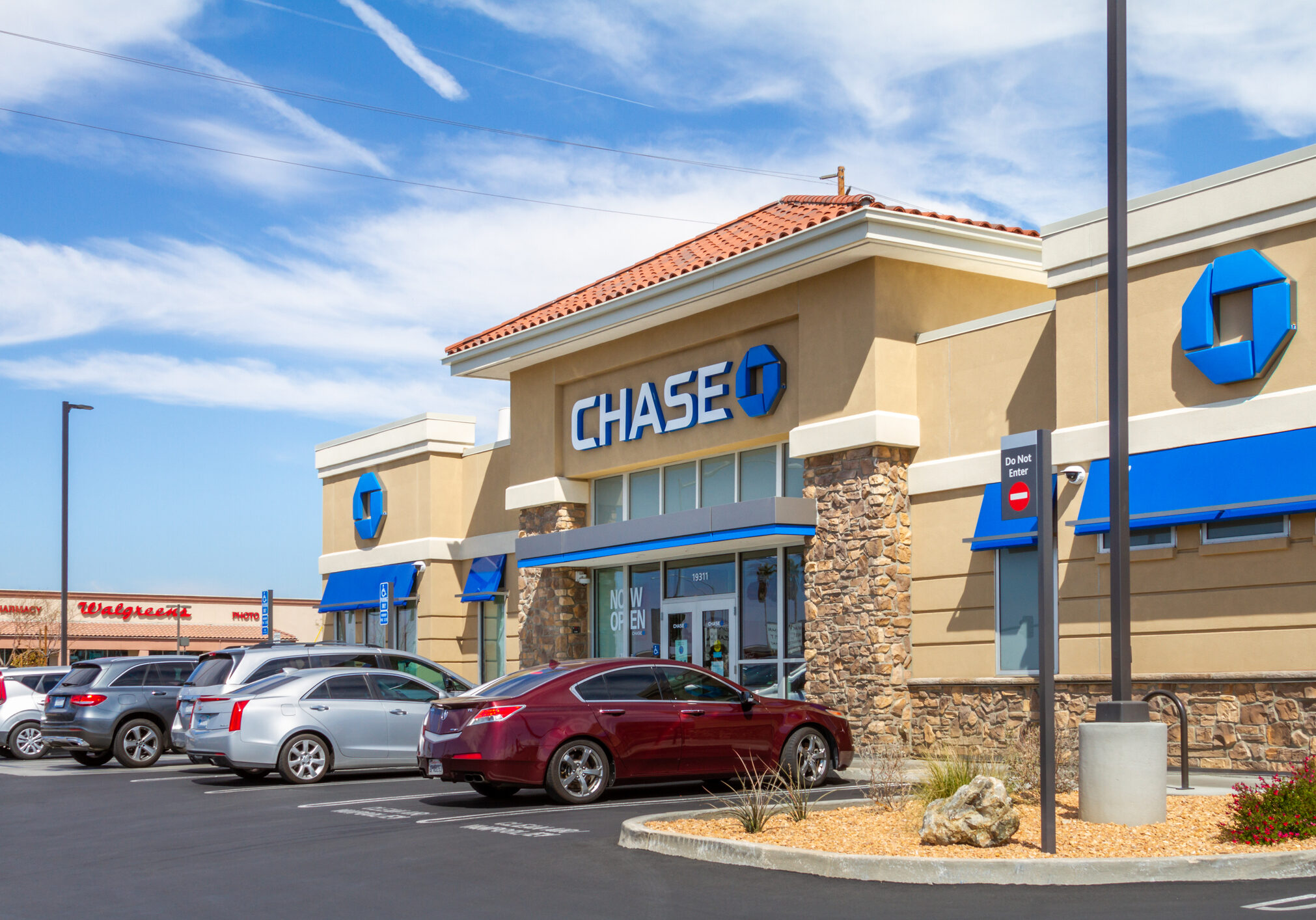 Chase bank building in Apple Valley, CA Apple Valley, CA, USA – March 17, 2021: Parking lot view of the Chase bank building at Jess Ranch in the Town of Apple Valley, California.